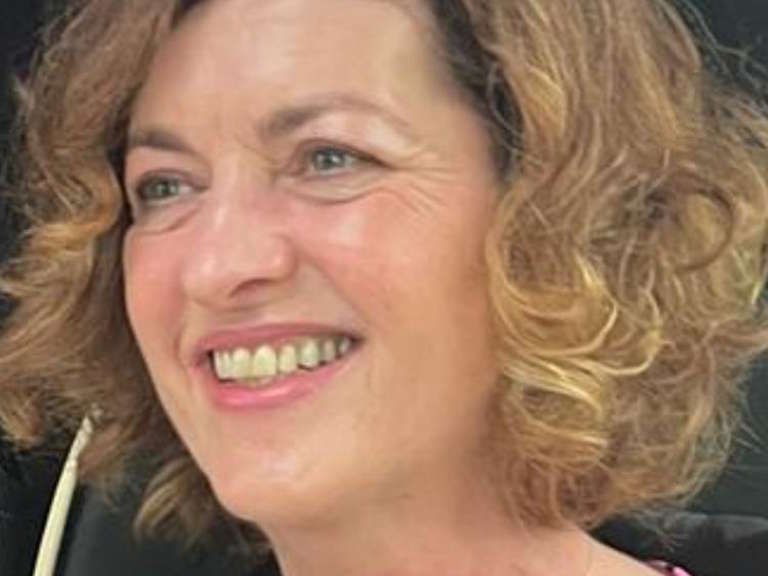 Dr Katrina O'Donnell, retired GP and sleep health advisor, smiling.