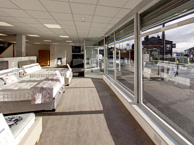 A view of the front of the showroom with wide open doors